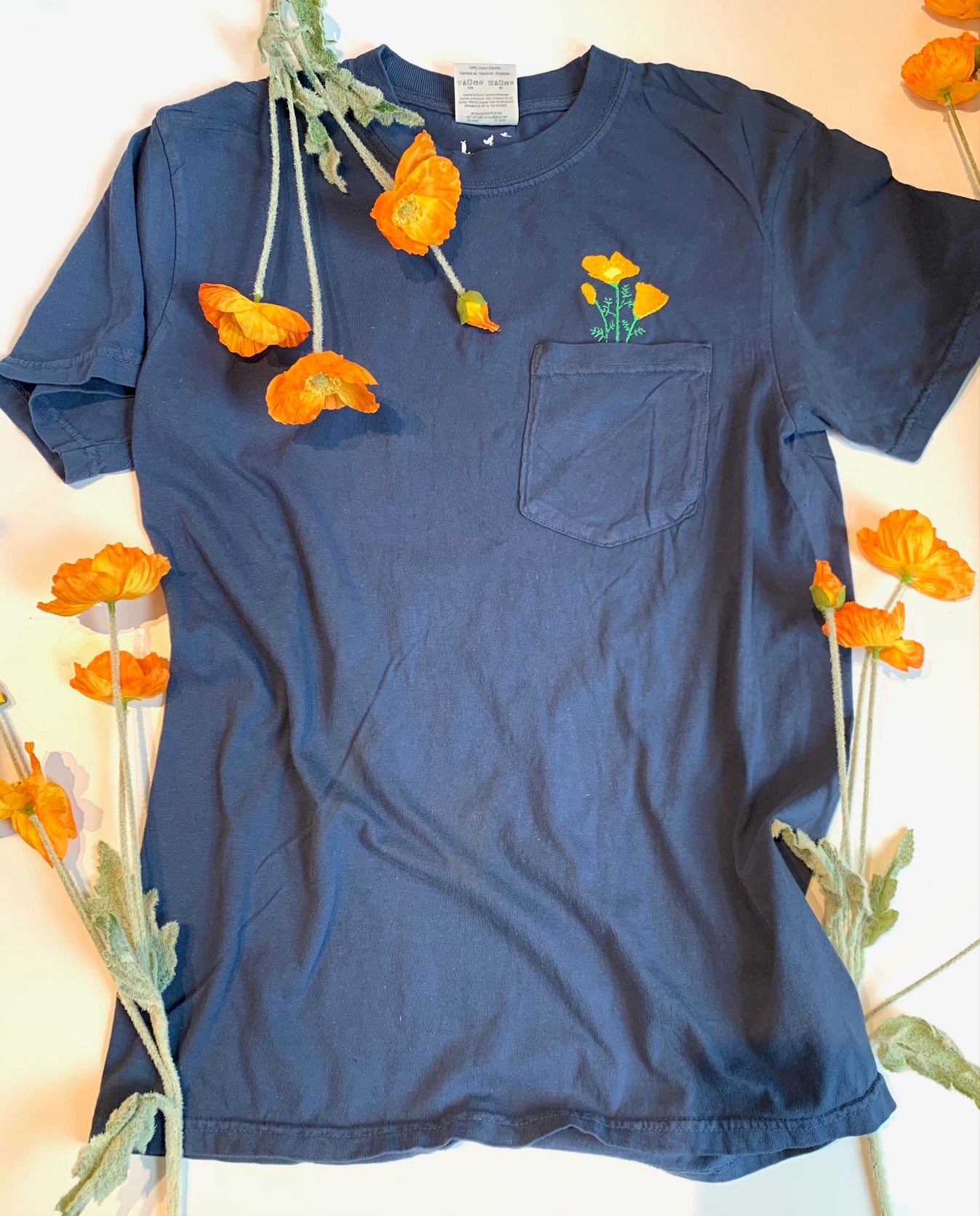 Unisex Embroidered California Poppy Pocket Tee in Comfort Colors