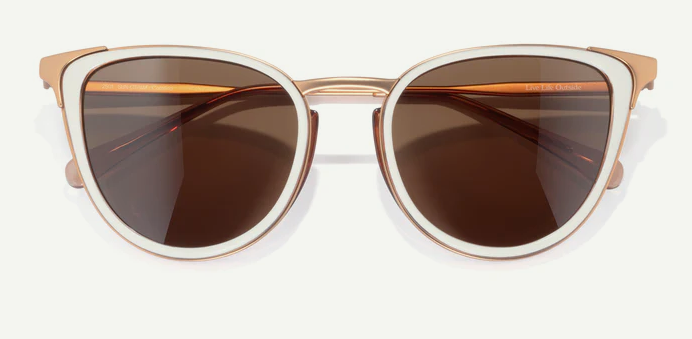 cateye sunglasses with gold frame and brown lenses on a white background