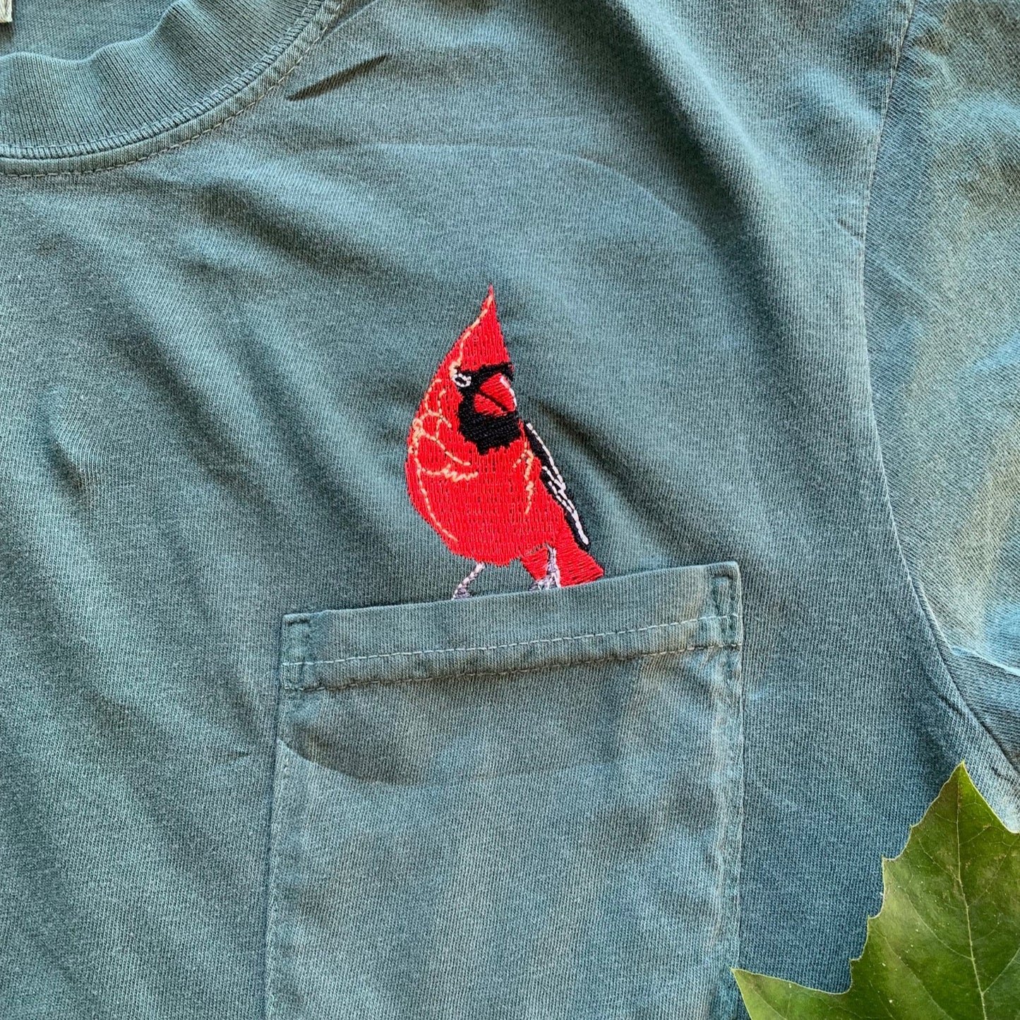 Embroidered Cardinal Bird Watcher Pocket Tee for Nature Lovers On Blue Spruce Shirt