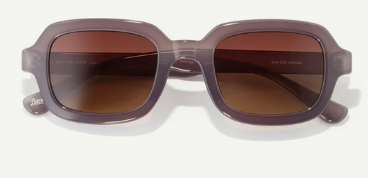 thick dusty purple frames with warm amber-brown lenses