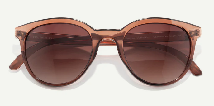 see through warm brown frames with deep red-purple lenses