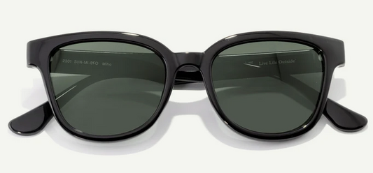 Black sunglasses with dark lenses on a white background