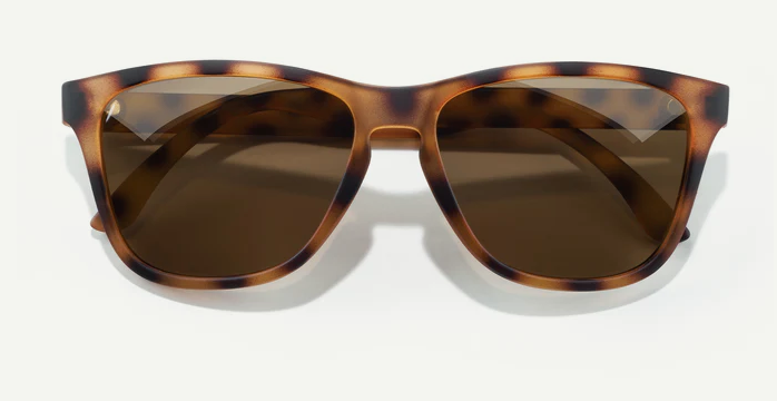 tortoise patterned cat eye shaped glasses with brown lenses
