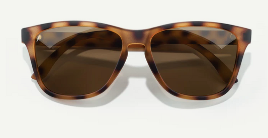 tortoise patterned cat eye shaped glasses with brown lenses