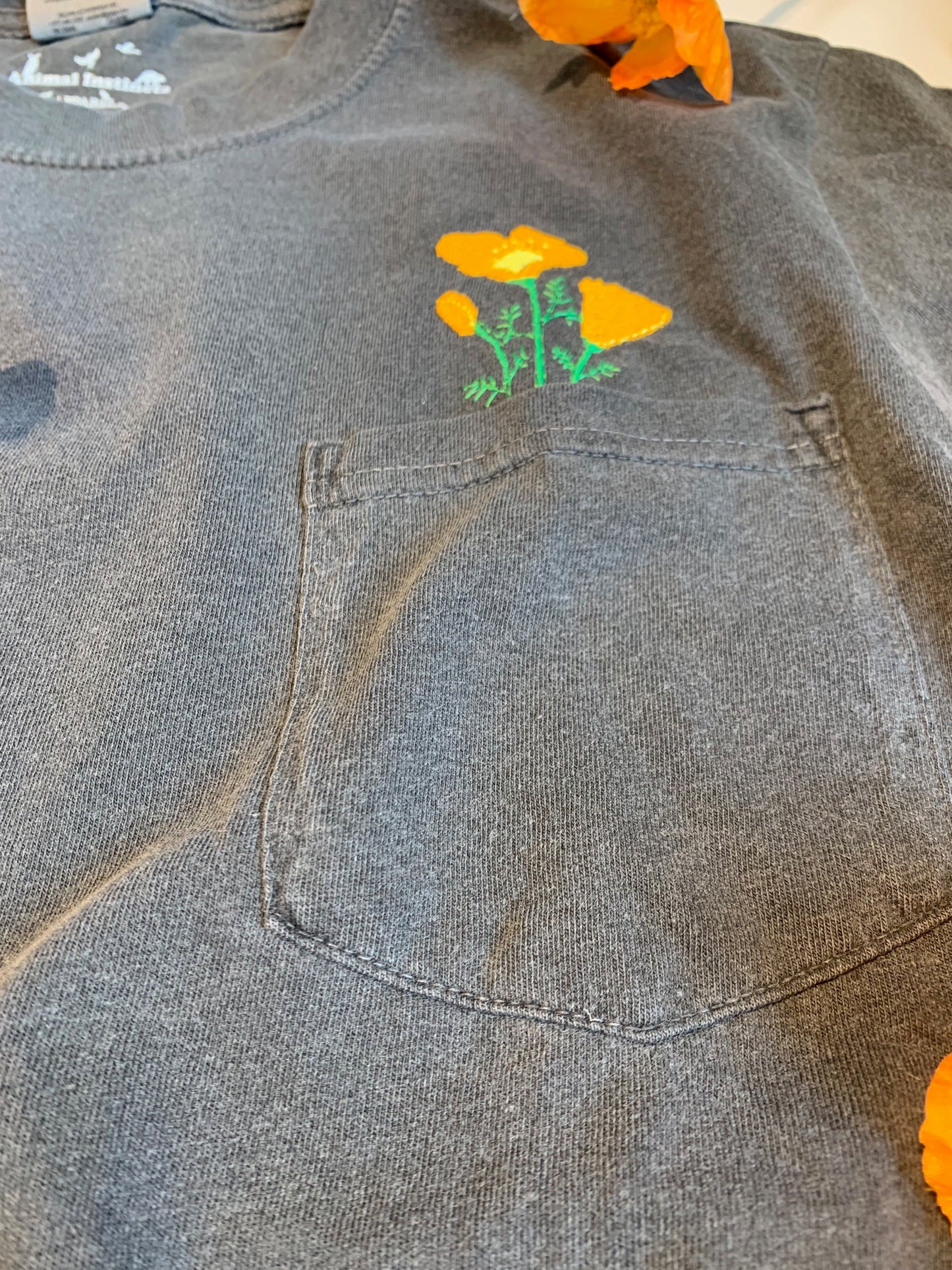 Unisex Embroidered California Poppy Pocket Tee in Comfort Colors