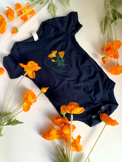 Embroidered California Flower Baby Bodysuit in Navy Cotton