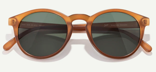 Round brown cateye sunglasses with dark lenses on a white background