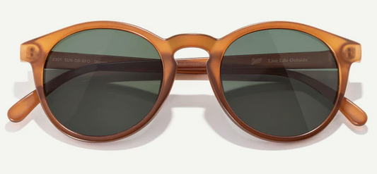 Round brown cateye sunglasses with dark lenses on a white background