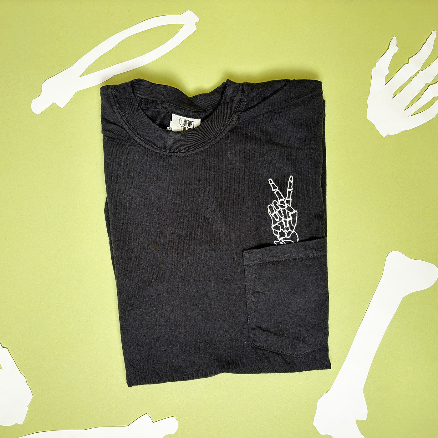 Unisex Embroidered Skeleton Peace Hand Pocket Tee