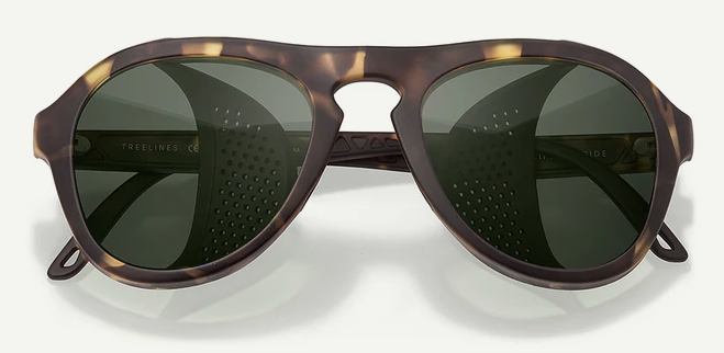 Sunglasses with tortoiseshell frame and dark green lenses on a white background