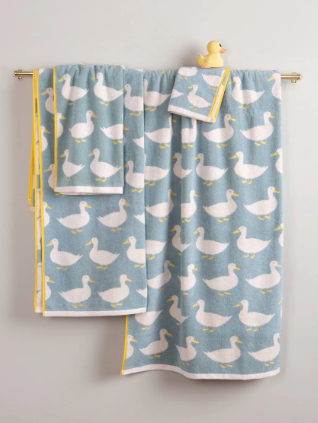 Anorak Waddling Ducks Organic Cotton Towels Blue back ground with white ducks