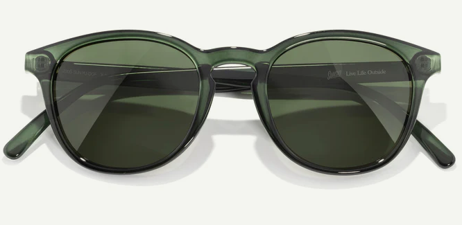 Green sunglasses with green lenses and a white background